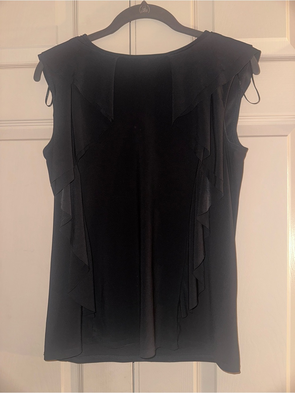 CeCe Black Sleeveless Ruffle Front Top